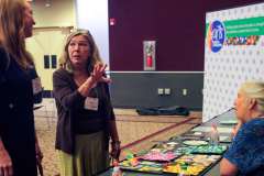 Advocates at Community Arts Project table