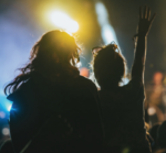 Adult and child at a concert